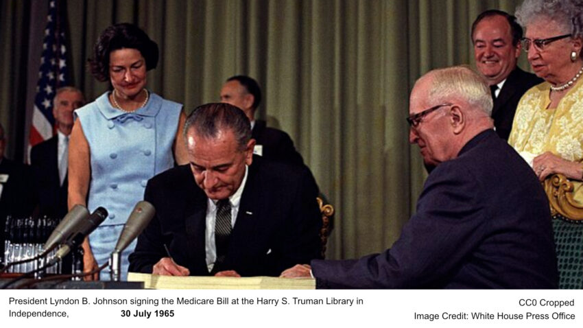 President Lyndon B. Johnson signing the Medicare Bill at the Harry S. Truman Library in Independence, 30 July 1965